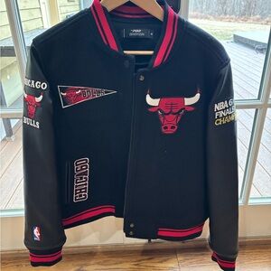 Bulls Vasity Jacket w/leather arms kids size M. bought at game!